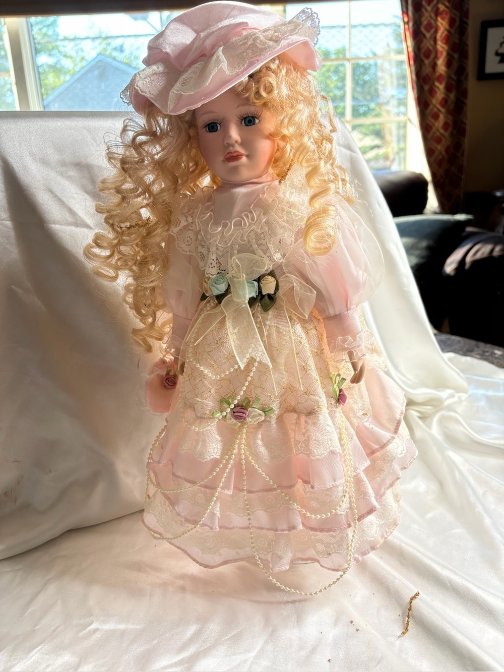 BEAUTIFUL PORCELAIN BLONDE HAIR DOLL ON STAND WITH PINK DRESS
